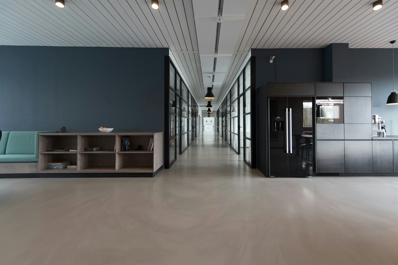 LawDrive atelier interior with daylight and folio workspace